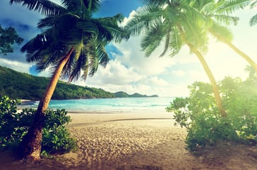 sunset on the beach Takamaka, Mahe island, Seychelles